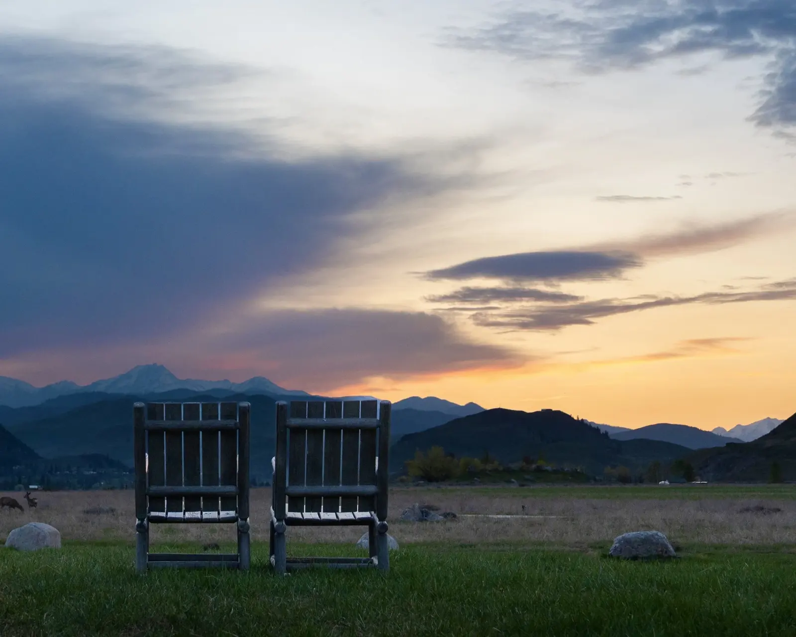 Rocking chairs at sunset