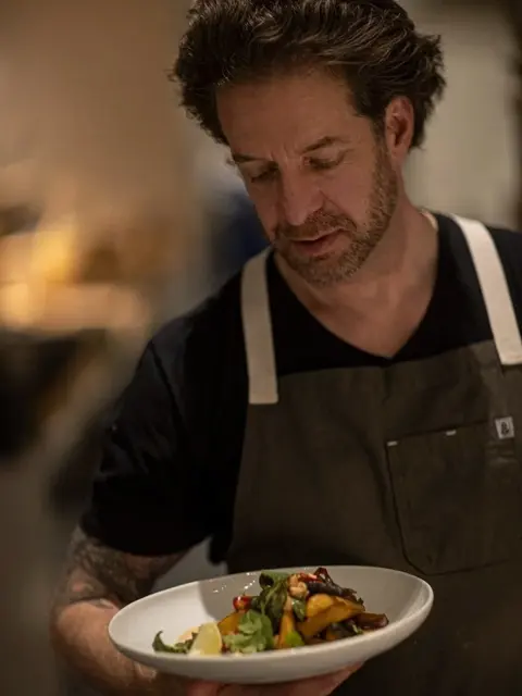 Chef Jason Wilson in the kitchen