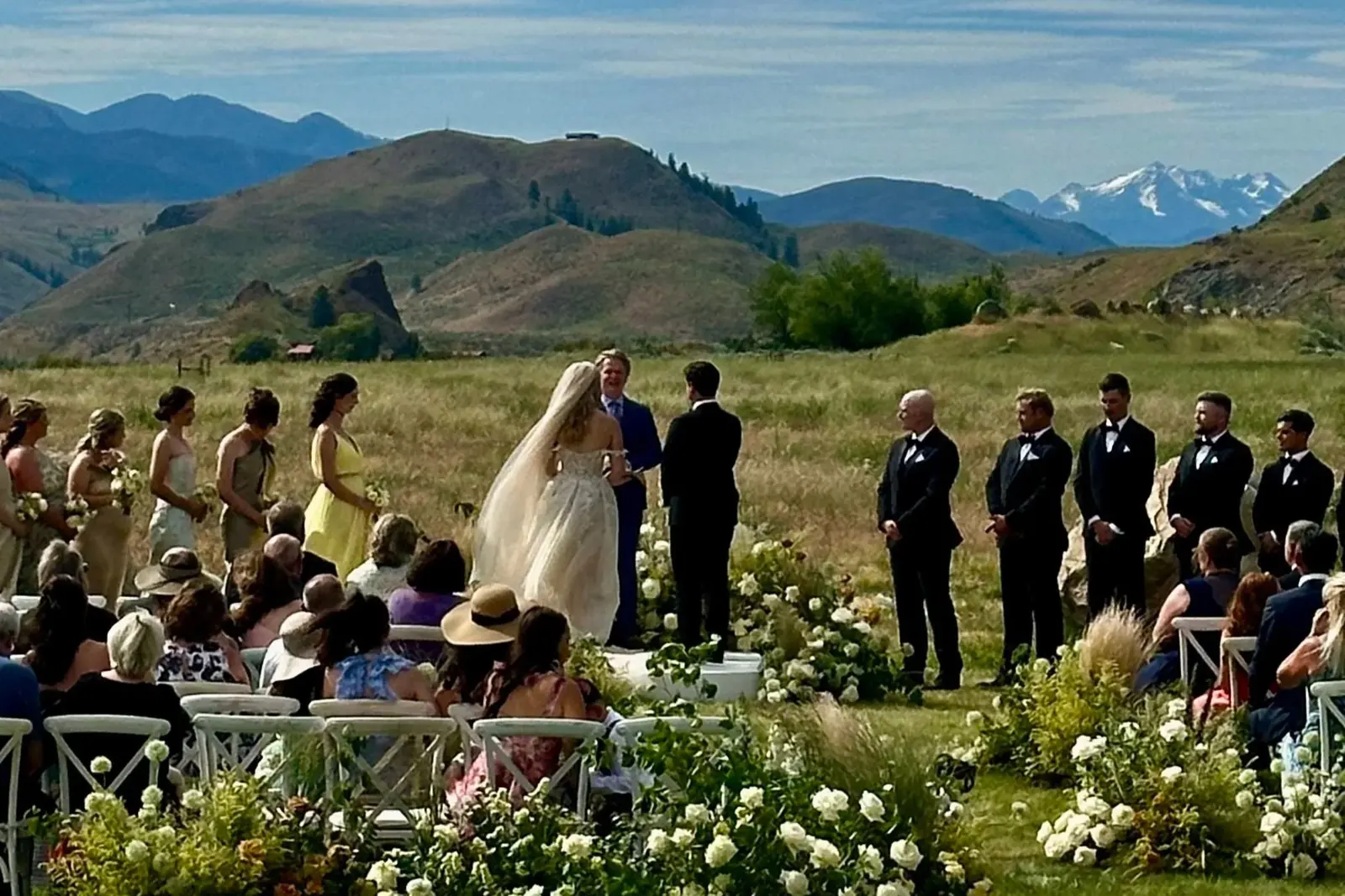 Wedding ceremony with mountains behind